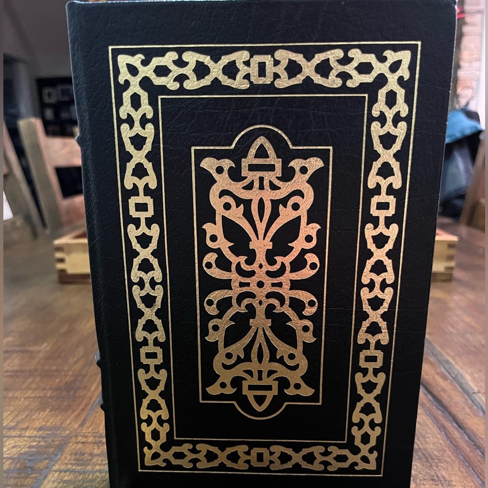 Black Book with Gold Ornate Design